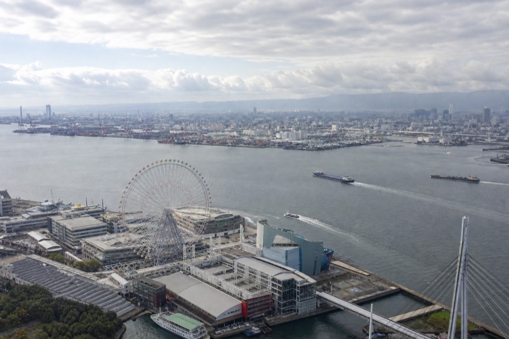 Aerial view of Tempozan Harbor Village with the wheel, marketplace, and bay