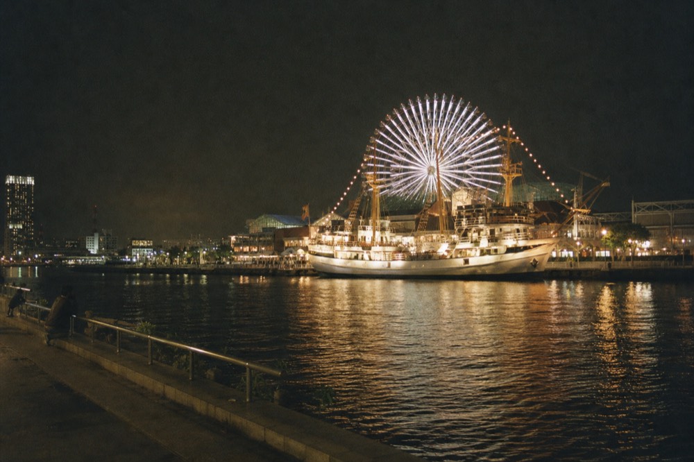 Tempozan Harbor Village waterfront with the wheel and Santa Maria cruise ship
