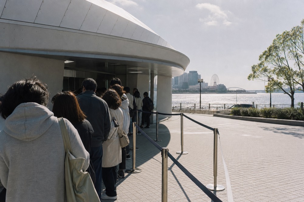 Timed-entry ticket gates at an aquarium entrance building